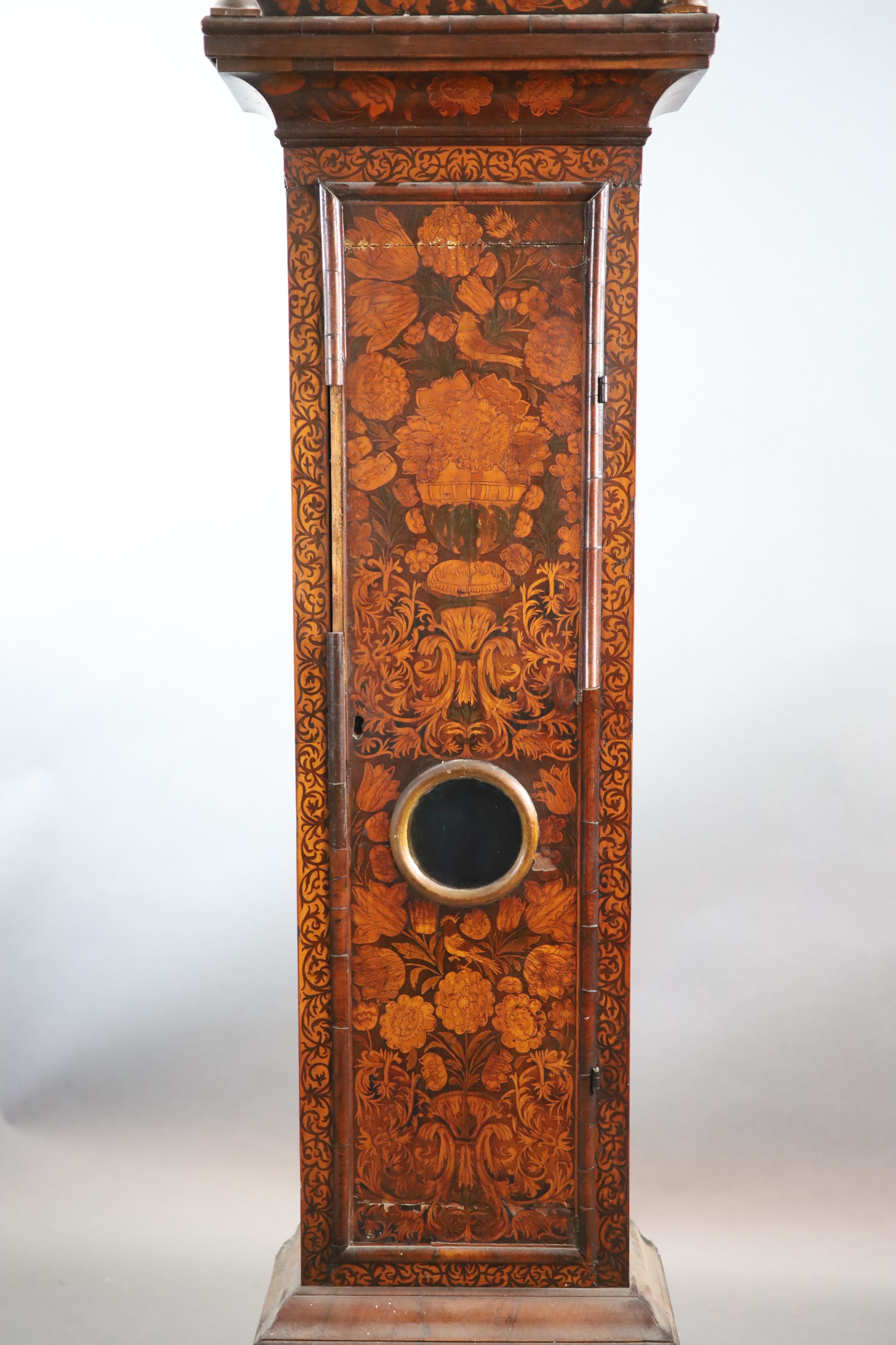 An early 18th century walnut and floral marquetry longcase clock